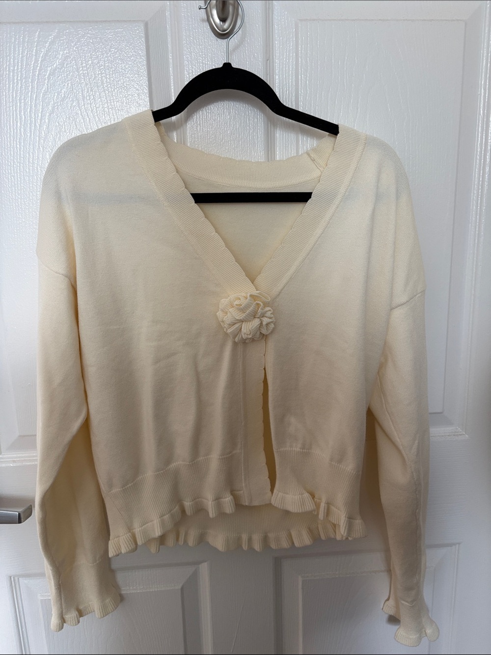 Cream cardigan with flower